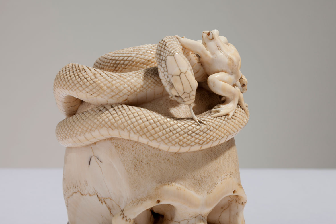 Japanese Ivory Skull with Coiled Snake and Toads